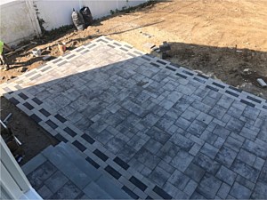 modern gray brick paver patio nicolock granite city alpine smooth pewter raven plank pavers herringbone border design seat wall contemporary